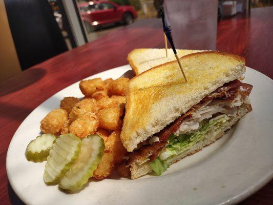 Turkey club sandwich sans tomato w upcharge tots