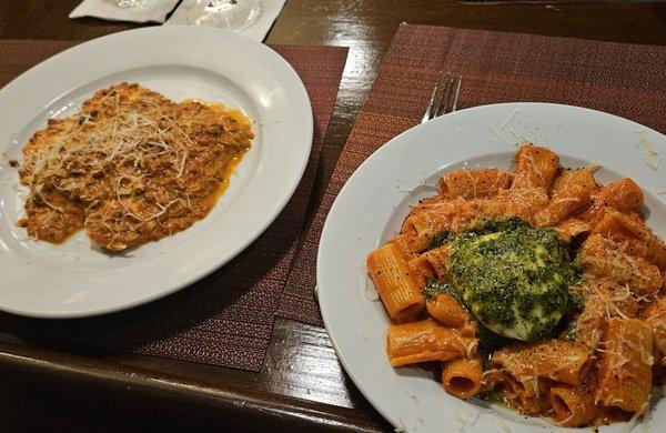 4 cheese ravioli with bolognese sauce and spicy rigatoni topped with barrata and pesto.