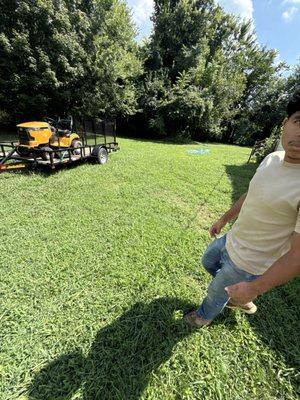 My trailor and mower with my first lawn