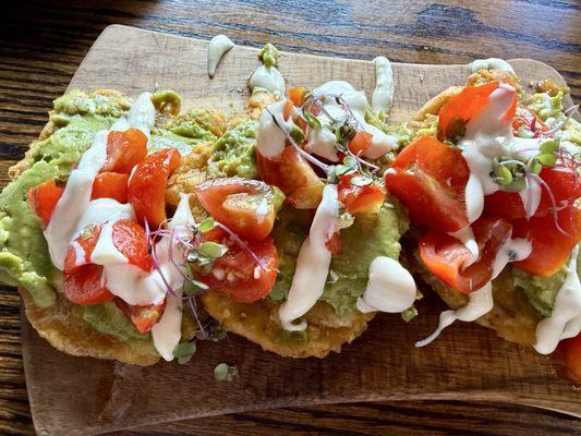 Fried plantains with avocado and cherry tomatoes