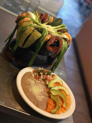 Molcajete para Dos: 
This Authentic dish (for 2) comes in a hot stone bowl; carne asada, grilled chicken, grilled shrimp, sausage, grilled