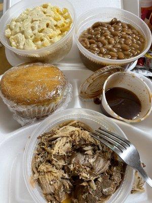 ($25 choice credit). Pulled pork, corn bread (or Kaiser roll option), Mac n cheese, baked beans, bbq sauce. Soda not pictured