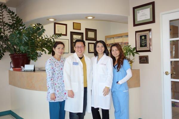Dr. Julie Tran, Dr. Toan Nguyen, and staff