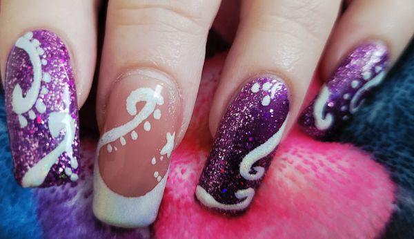 Acrylic nails with gel polish and nail design.