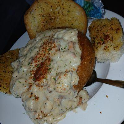 Clam chowder in sourdough bowl with garlic bread! Sooo much better than we had in San Francisco, not joking