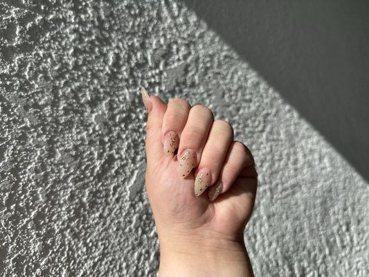 Acrylic nail set gel polish medium length.