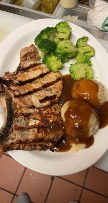 Thursday special. 2 pork chops grilled with mashed potatoes and broccoli