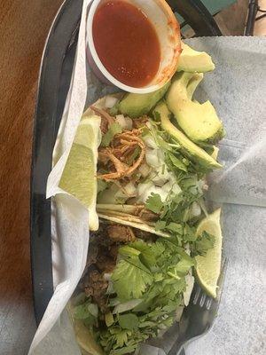 Tinga and steak tacos with avocado