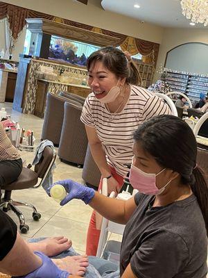 Gentle nail techs helping my sweet elderly friend.  thank you.