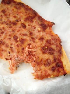 Dried up, warmed up, old pizza...horrible!!! It's like they warmed up an old pizza and drizzled oil on it. Place is a dump!