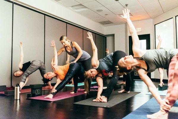 Making hands on adjustments during class