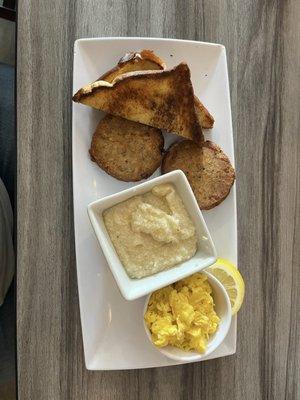 Eggs, grits, sausage, and toast