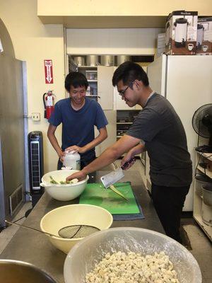 This boys preparing good food for the church