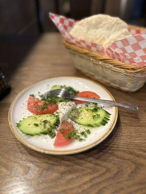 Complimentary cucumber, tomato and feta