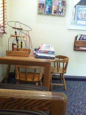 Play area for kids. Books and magazines for young and old