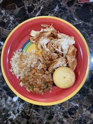 Dinner is served: pulled chicken, white rice, baked beans, and corn bread muffin