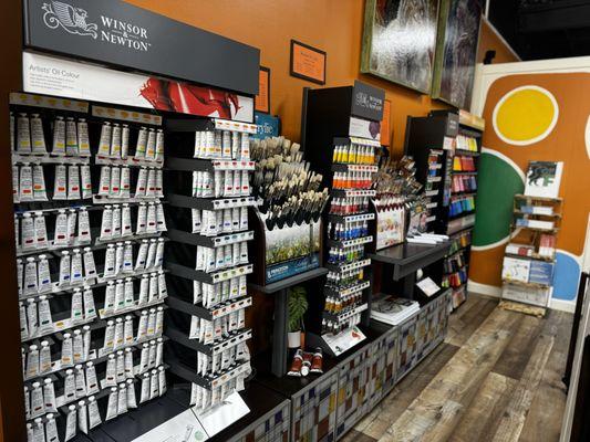Paints and brushes for acrylic, oil, and watercolor.