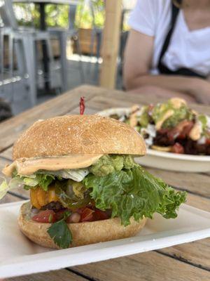 Fuego Burger: jalapeños, cheddar, chipotle aioli, lettuce, tomato, onions, guacamole