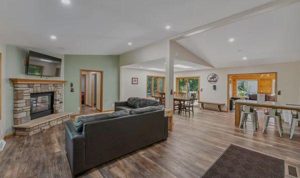 Cozy open family room and kitchen which allows the chef of the family to be included even when a meal needs preparing.