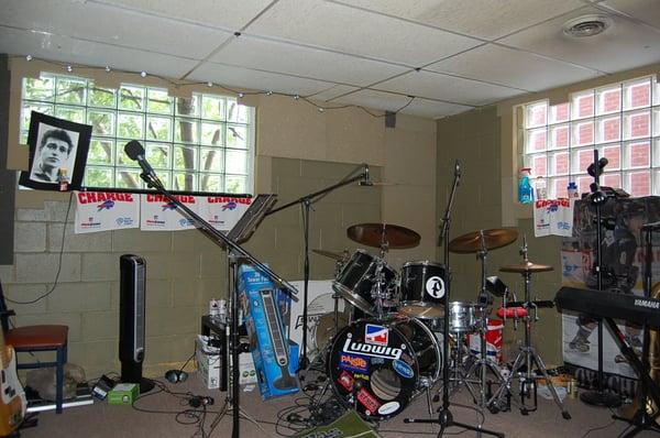 A room with a talented act and all of their gear.