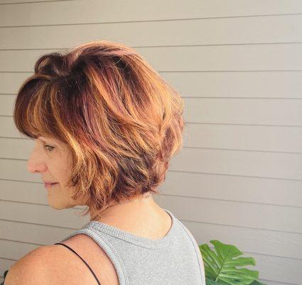 color correction. We did Jill's roots and then a highlight with a warm gloss to even out the tone from previous color she had on her base.