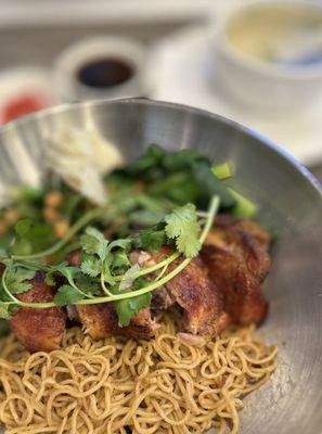 Mì Khô Gà Nướng Lu Đùi: Dry Egg Noodles w/Clay Jar Grilled Chicken Thigh, House Dipping Sauce, Side Soup + Fresh Chili | $17.5