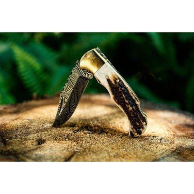 Deer Antler Pocket Knife - This Pocket Knife is a beautiful masterpiece with its Damascus Steel blade.
