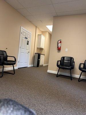 Seating area/bathrooms