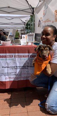 Kai showing some love to Dr. Nickens-Johnson at Wags n' Whiskers