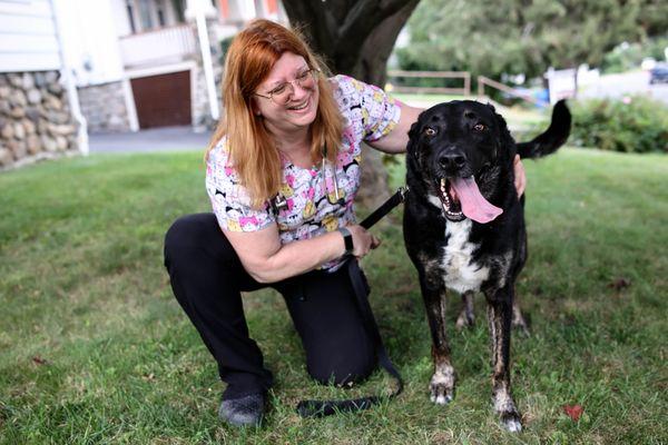 Dr. Brenda with her dog Caesar.