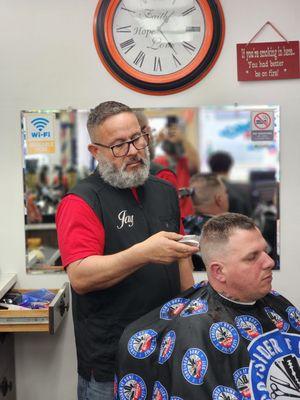 Master Barber Mr. Cee displaying his skills for 30 plus years.