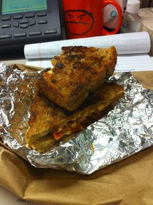 Mexican grilled cheese - (cheese, chorizo and tomatoes)