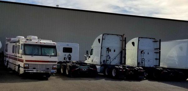 Lots of vehicles being worked on.