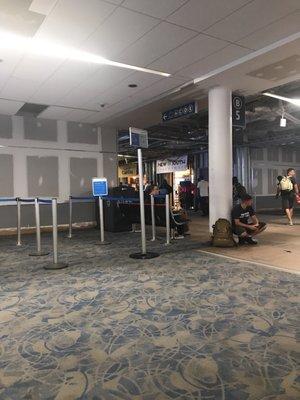 New South TravelMart now Open! Temp sign