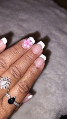 French manicure with a 3D flower