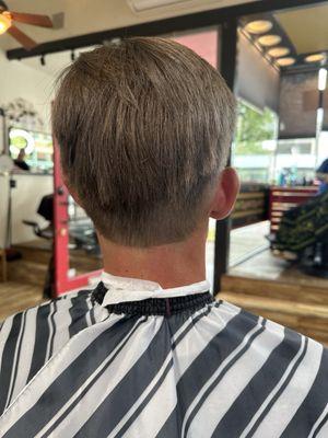A Barber a a different shop wanted to take photos and of the haircut I got from The Barbers