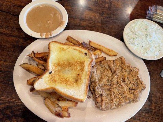 Country Fried Steak Plate with fries and slaw.