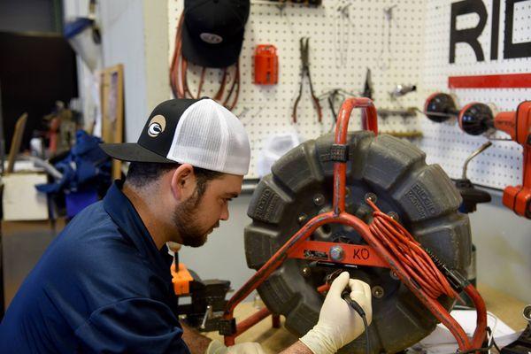 Repair Tech, Danny, repairing a Ridgid Mini SeeSnake