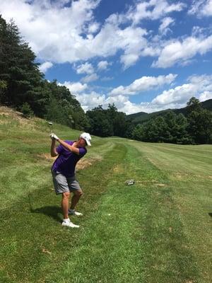 Second shot on #14. I took this one left, because on this course you must be LEFT. It went out of sight, bounced off a boulder, and on.