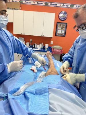 Doctor Mackay performing a phlebectomy