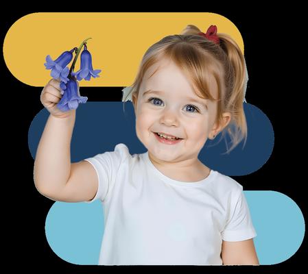 A young girl holding a flower