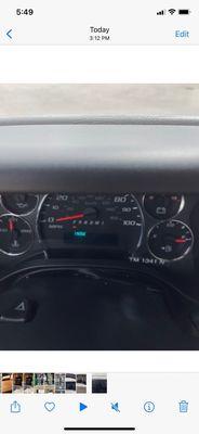 Photo showing fuel gauge to be over full line upon return.