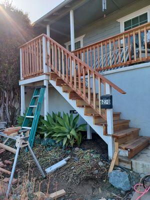 New hand rail and refurbished stairs.