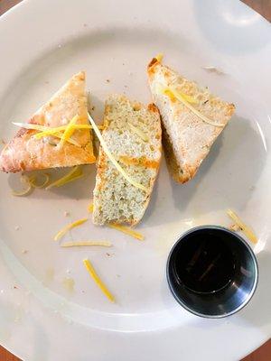 Garlic bread with lemon zest and olive oil with herbs and basalmic vinegar