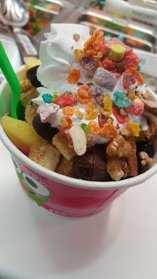 Raspberry, Pomegranate and Pineapple Dole Froyo with fresh pineapples, strawberries, cherries, etc. with whipped cream and fruity pebbles!