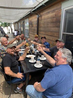 Enjoying the local coffee housr