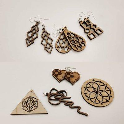 Some designs created by participants in the laser cut jewelry class