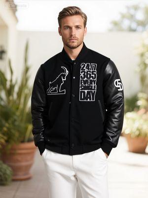 Model is wearing the The Zenith GOAT Varsity Jacket