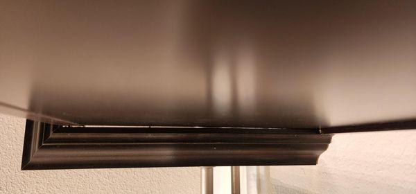 Framing on cabinets were loose and flush