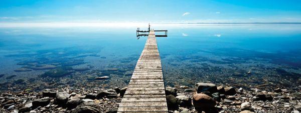 A dock on East Grand Traverse Bay. Modified in Photoshop.